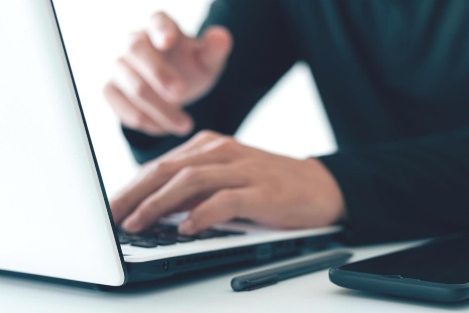 Professional traders analyzing futures market data on multiple screens