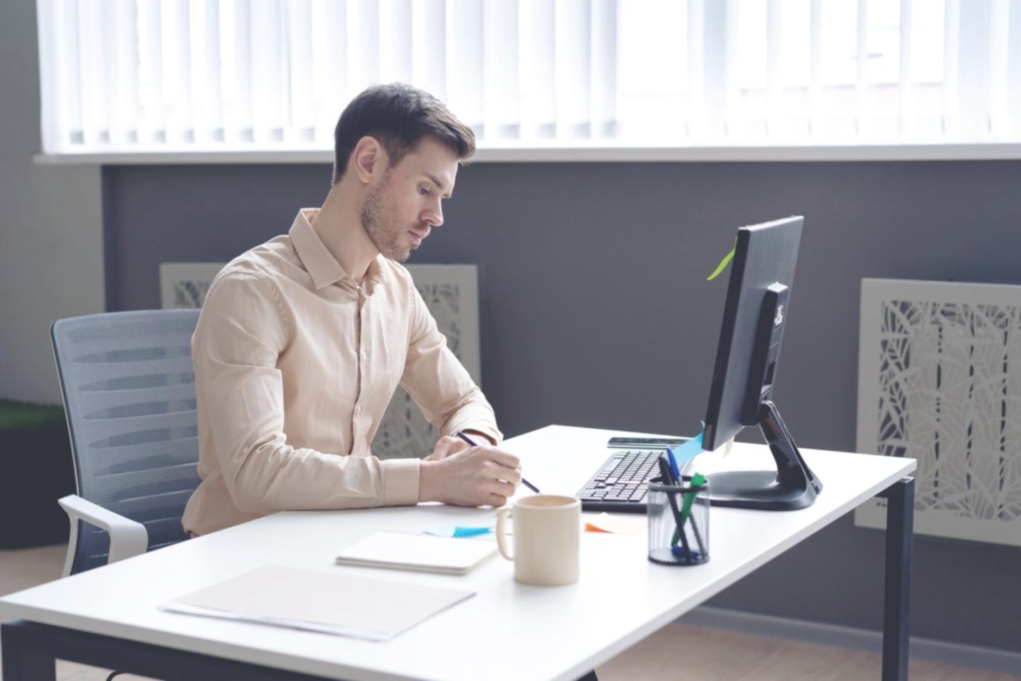 Trading desk setup with multiple monitors displaying market charts and analysis tools